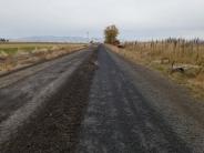 Grader up the gravel road